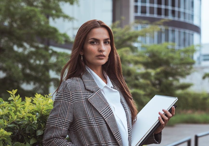 portrait of brown haired woman in coat